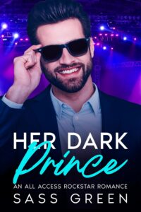 Book cover of Her Dark Prince by Sass Green, rockstar romance, smiling man lowering his sunglasses under stage lights.